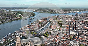 City center of Dordrecht, Dordt, South Holland, The Netherlands skyline along the Oude Maas river canal. Grote Kerk and