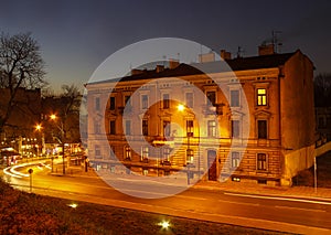 City center by night: ancient temements, Krakow, Poland