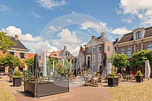 The city center square with pubs and restaurants in Workum, Friesland, The Netherlands