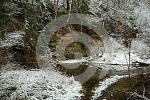 City Cesis, Latvia. Red sand rocks and snow in winter.Travel photo