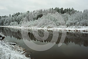 City Cesis, Latvia.River Gauja at winter,  trees and snow