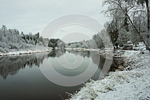 City Cesis, Latvia.River Gauja at winter,  trees and snow