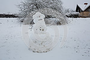 City Cesis, Latvia. Snowman in winter with white snow. Travel photo