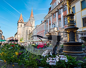 City church with market of Ansbach in Bavaria photo