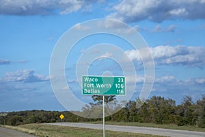 city distances to Waco, Fort Worth and Dallas at sign at interstate 35