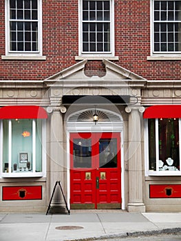 City: elegant red store front