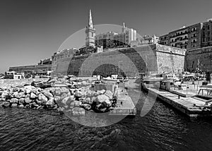 City embankments of Valletta. To fish. Malta. Black and white photo