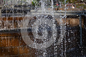 City fountain with splashes and jets of water hardened