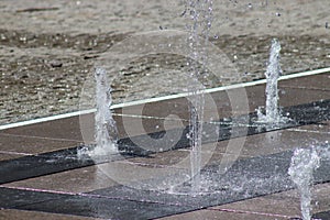 City fountain on a summer sunny day