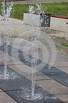 City fountain on a summer sunny day