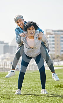 City, funny and senior women piggyback together playing, crazy and funny with as friends for outdoor exercise. Health