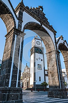 City Gates Monument framing the SÃÂ£o SebastiÃÂ£o Church in Ponta Delgada on the island of SÃÂ£o Miguel, Azores PORTUGAL