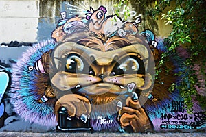 The city graffiti on the cement wall