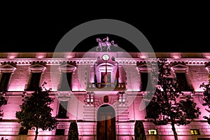 City Hall building in downtown Granada Spain, lit up at night