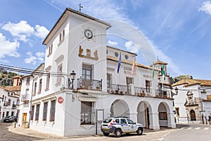 City Hall of Grazalema, considered one of the most beautiful white villages in Spain, with a Local Police Policia Local car
