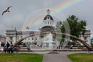 City Hall of Kingston, Ontario, Canada on an overcast day with rainbow in the sky