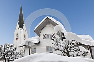 Snow in Oberstdorf, fresh fallen snow in winter in Bavaria, Germany photo