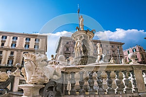 City Hall Square with the famous Neptune fountain on Piazza Municipio in Naples, Italy.