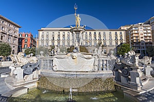 City Hall Square with the famous Neptune fountain on Piazza Municipio in Naples, Italy