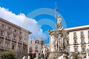 City Hall Square with the famous Neptune fountain on Piazza Municipio in Naples, Italy. photo