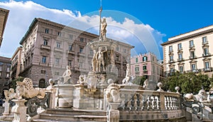 City Hall Square with the famous Neptune fountain on Piazza Municipio in Naples, Italy. photo