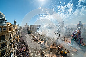 City hall square with fireworks exploding at Mascleta during the Las Fallas festival in Valencia Spain on March 19, 2019