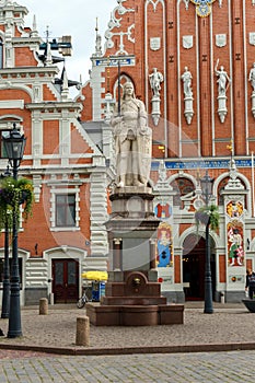 City Hall Square with House of the Blackheads and sculpture of Saint Roland and Saint Peters Church, Riga Old Town, Latvia, July