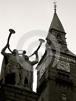 City Hall Tower on City Hall Square Copenhagen with Lur Blowers bronze statue by Siegfried Wagner. Black and white