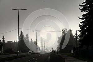 City in haze at day, air pollution concept photo