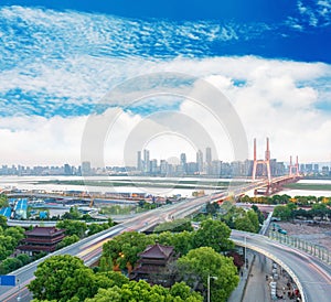 city interchange bridge on traffic rush hour