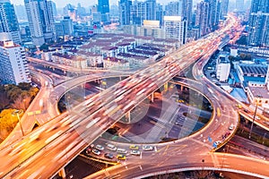 City interchange closeup at busy nightfall