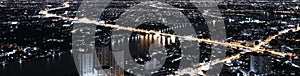 city interchange closeup at night, Aerial view of road interchange or highway intersection with busy urban traffic speeding