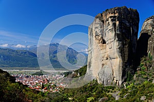 City of Kalabaka under the picturesque Meteora rock formations in Greece photo