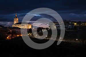 City landscape of Colmenar de Oreja illuminated at night, Spain photo