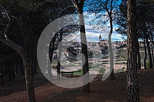 City landscape of Colmenar de Oreka among the pines under a blue sky, Colmenar de Oreja, Spain photo