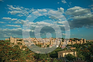 City landscape with large stone wall and towers at Avila