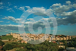 City landscape with large stone wall and towers at Avila