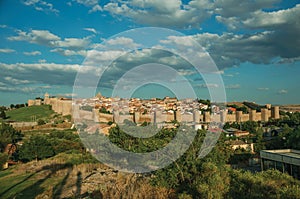 City landscape with large stone wall and towers at Avila