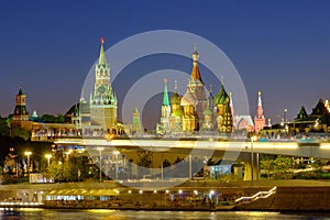 City landscape with night view on soaring bridge in Zaryadye and Red Square in Moscow