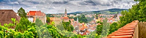 City landscape, panorama, banner - view over the historical part Cesky Krumlov with Vltava river in summer time