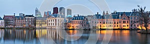 City Landscape, sunset panorama - view on pond Hofvijver and complex of buildings Binnenhof in from the city centre of The Hague