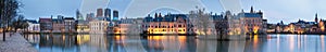 City Landscape, sunset panorama - view on pond Hofvijver and complex of buildings Binnenhof in from the city centre of The Hague