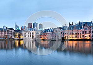 City Landscape, sunset panorama - view on pond Hofvijver and complex of buildings Binnenhof in from the city centre of The Hague