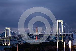 City landscape of Tokyo tower and rainbow bridge photo