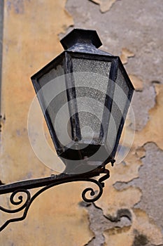 City lantern and old facade