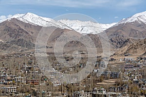 City of Leh in northern India with snow-covered mountains