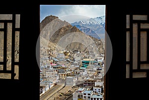 The city of Leh through windows from Leh Palace