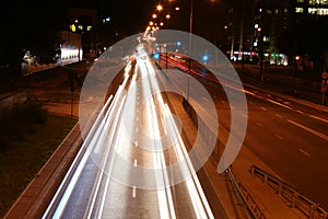 City lights long exposure street life in the city speed highway