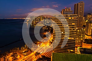 The City Lights of Waikiki Beach Skyline at Night