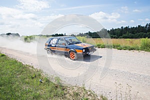 Amateur rally, dirt road, car with rider. Latvia 2018